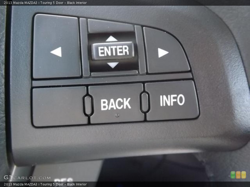 Black Interior Controls for the 2013 Mazda MAZDA3 i Touring 5 Door #80293049