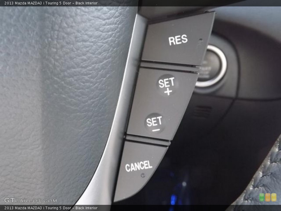 Black Interior Controls for the 2013 Mazda MAZDA3 i Touring 5 Door #80293070