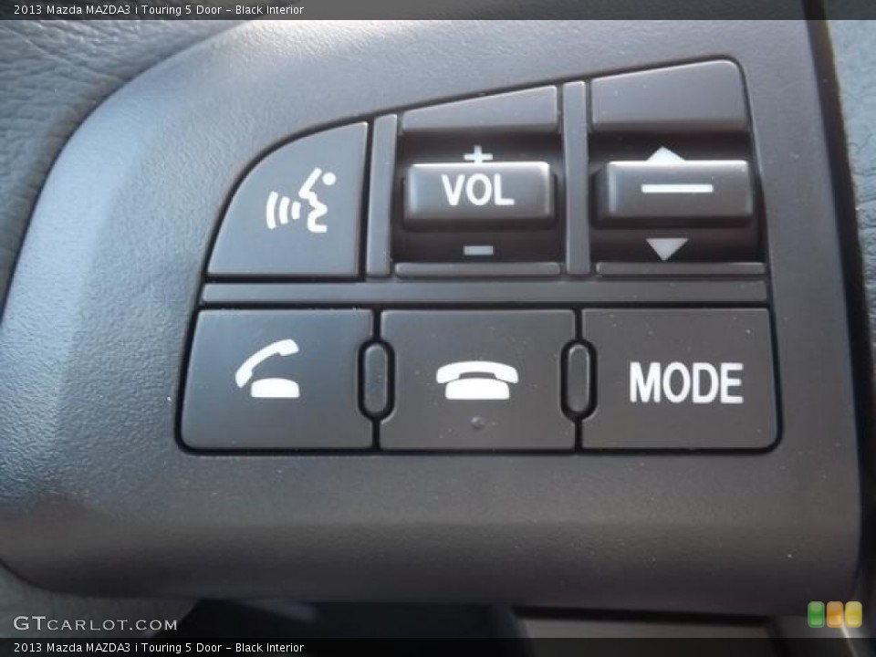 Black Interior Controls for the 2013 Mazda MAZDA3 i Touring 5 Door #80293091