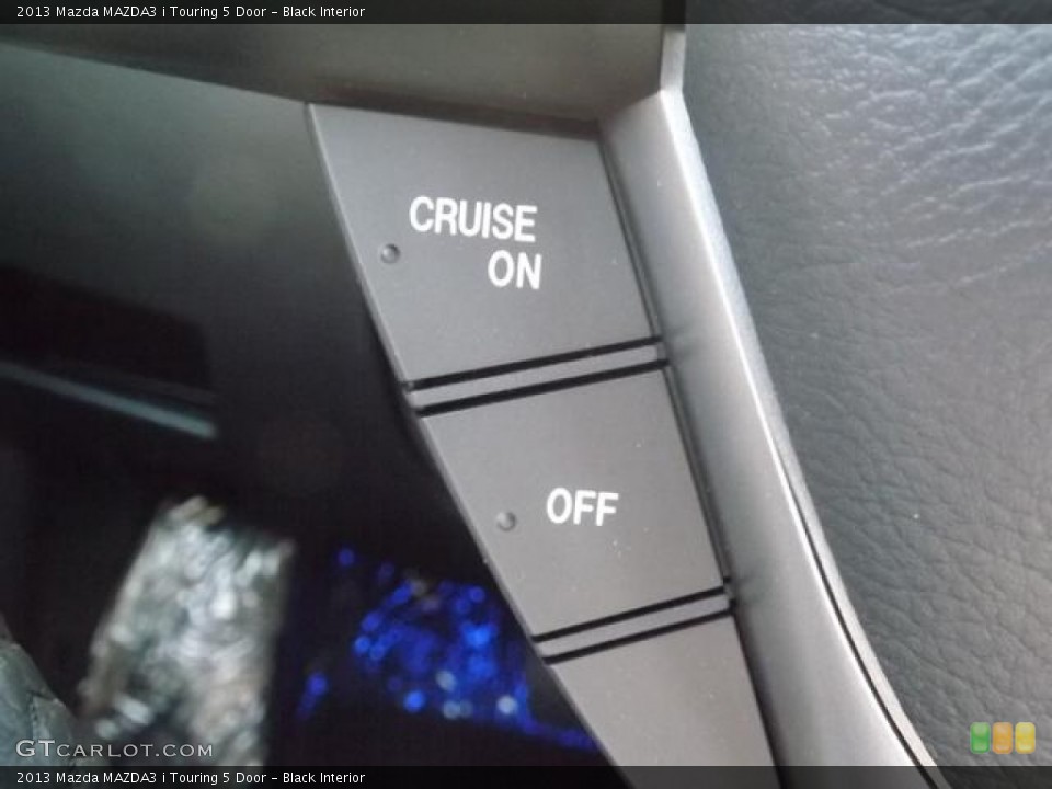 Black Interior Controls for the 2013 Mazda MAZDA3 i Touring 5 Door #80293108