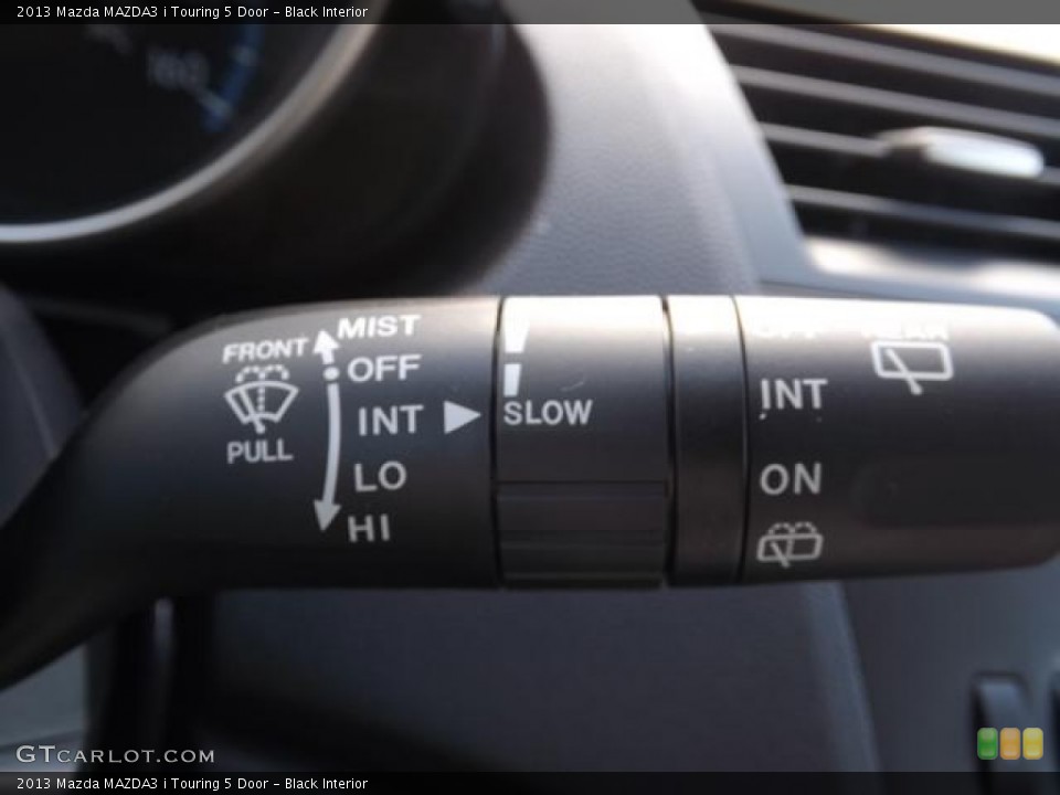 Black Interior Controls for the 2013 Mazda MAZDA3 i Touring 5 Door #80293130