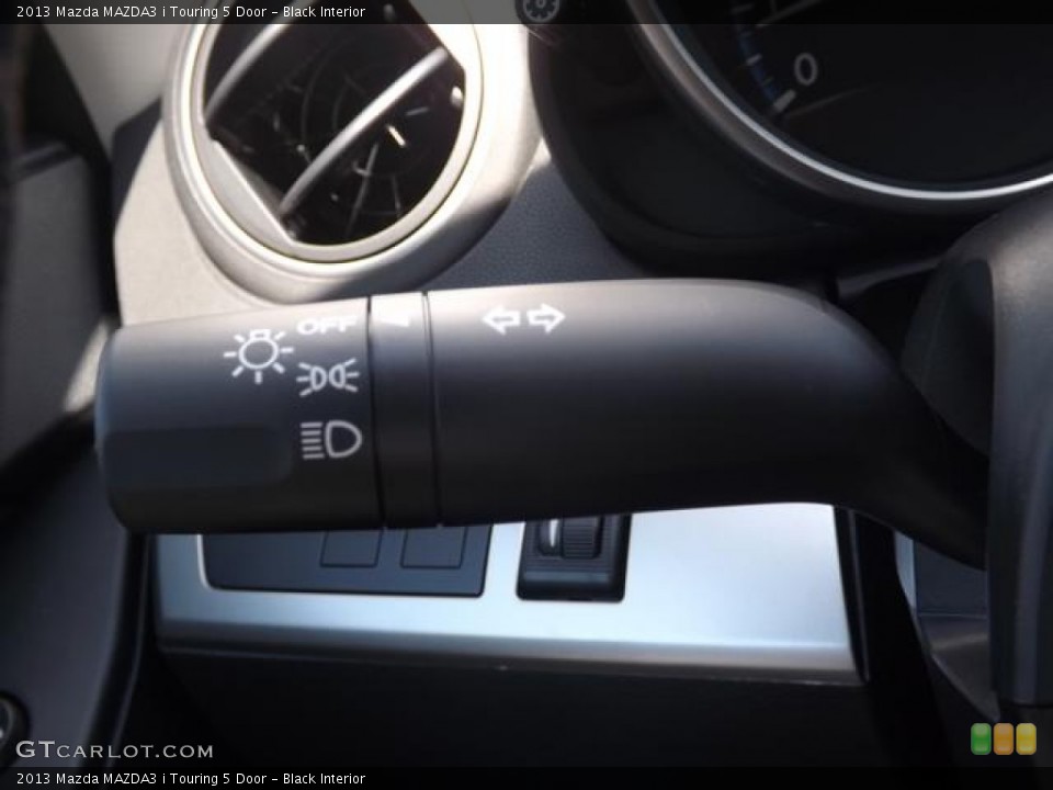 Black Interior Controls for the 2013 Mazda MAZDA3 i Touring 5 Door #80293147