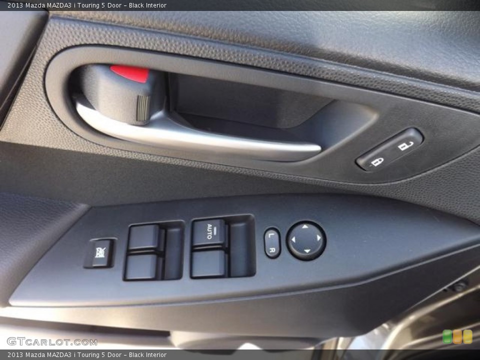 Black Interior Controls for the 2013 Mazda MAZDA3 i Touring 5 Door #80293239