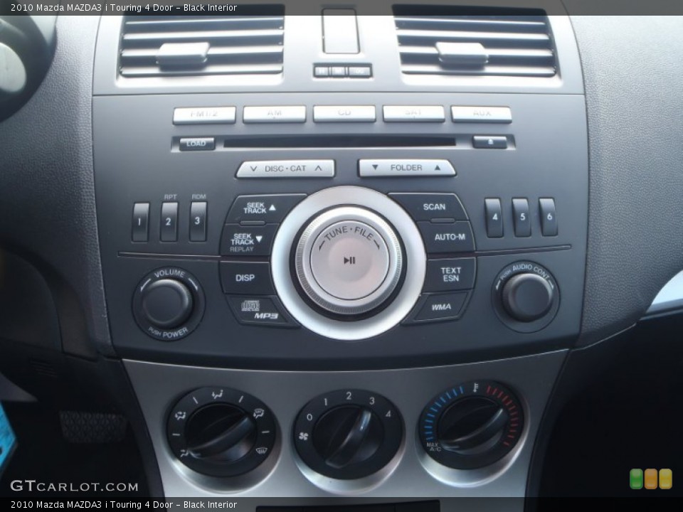 Black Interior Controls for the 2010 Mazda MAZDA3 i Touring 4 Door #80294036
