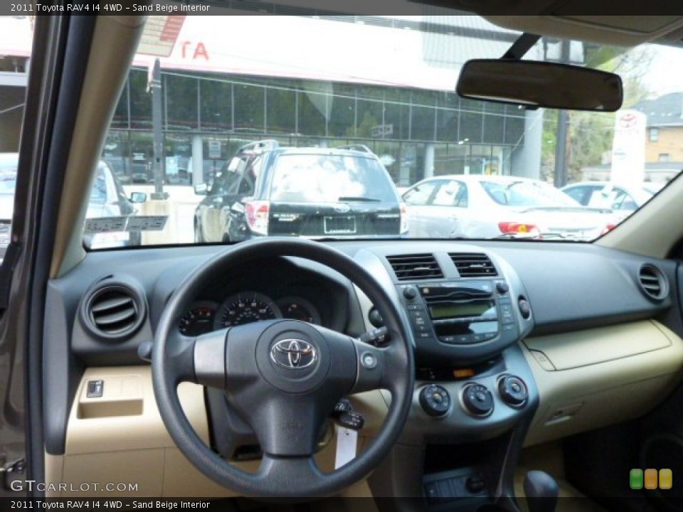 Sand Beige Interior Dashboard for the 2011 Toyota RAV4 I4 4WD #80302284