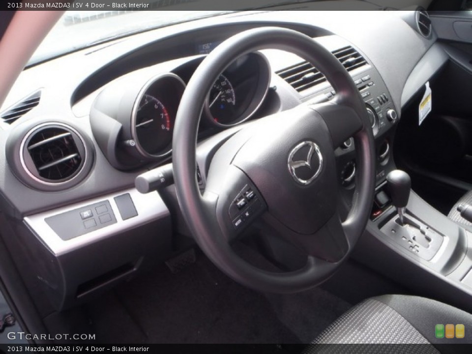 Black Interior Steering Wheel for the 2013 Mazda MAZDA3 i SV 4 Door #80326880