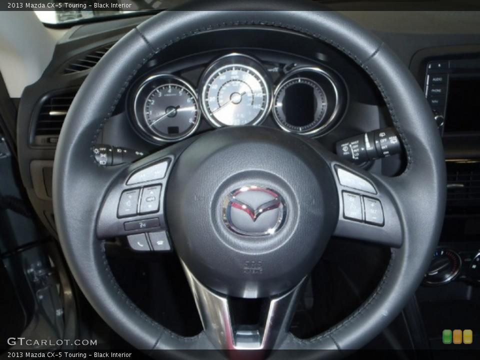 Black Interior Steering Wheel for the 2013 Mazda CX-5 Touring #80334206