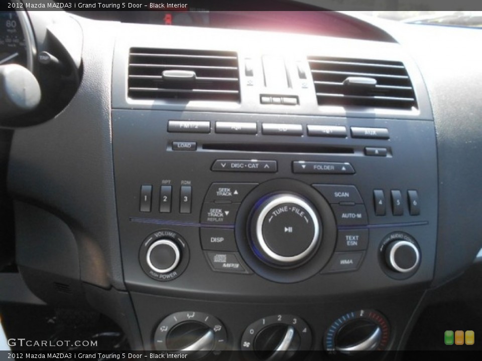 Black Interior Controls for the 2012 Mazda MAZDA3 i Grand Touring 5 Door #80336819