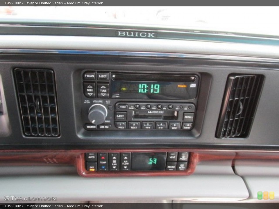 Medium Gray Interior Controls for the 1999 Buick LeSabre Limited Sedan #80344823