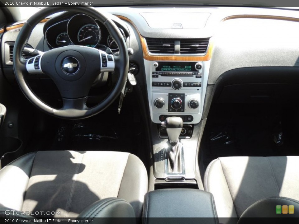 Ebony Interior Dashboard for the 2010 Chevrolet Malibu LT Sedan #80348316