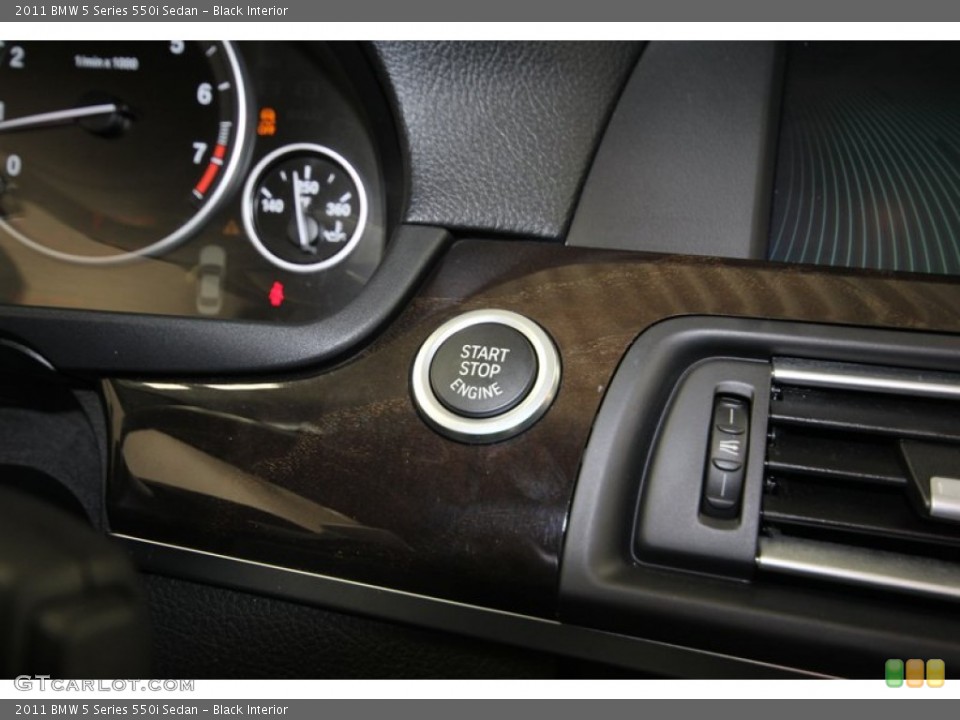 Black Interior Controls for the 2011 BMW 5 Series 550i Sedan #80349924