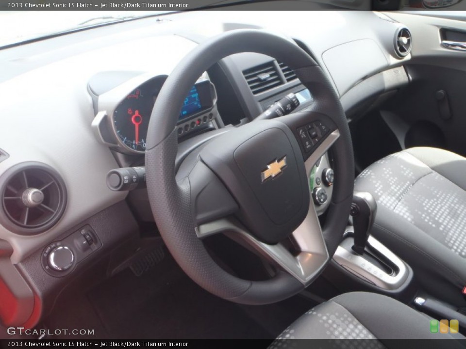 Jet Black/Dark Titanium Interior Steering Wheel for the 2013 Chevrolet Sonic LS Hatch #80378854
