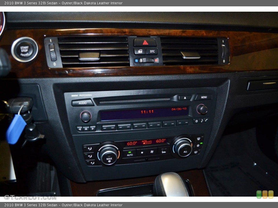 Oyster/Black Dakota Leather Interior Controls for the 2010 BMW 3 Series 328i Sedan #80383681