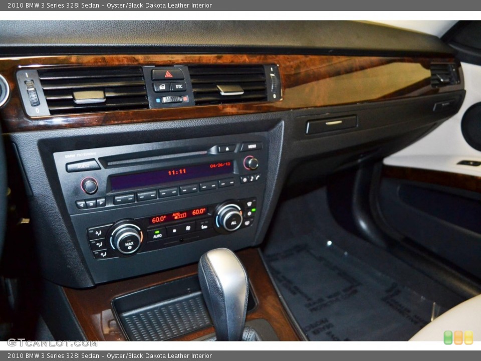 Oyster/Black Dakota Leather Interior Controls for the 2010 BMW 3 Series 328i Sedan #80383684