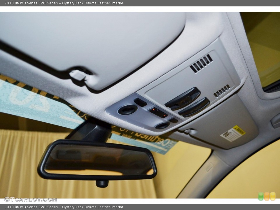 Oyster/Black Dakota Leather Interior Controls for the 2010 BMW 3 Series 328i Sedan #80383690