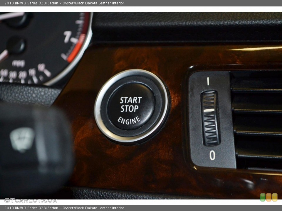 Oyster/Black Dakota Leather Interior Controls for the 2010 BMW 3 Series 328i Sedan #80383693