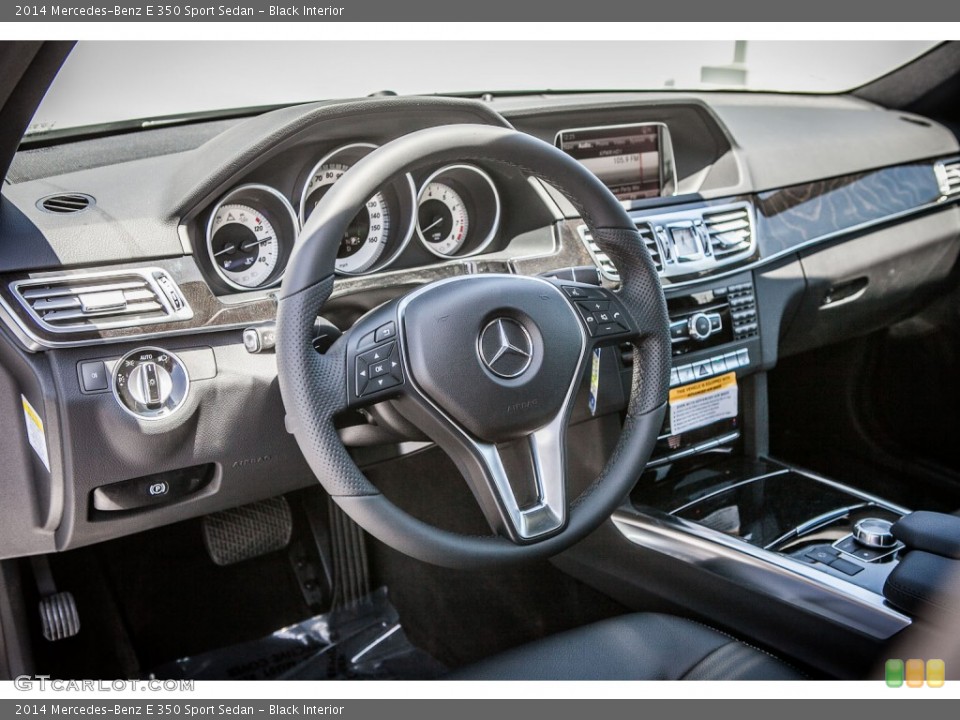 Black Interior Dashboard for the 2014 Mercedes-Benz E 350 Sport Sedan #80391288