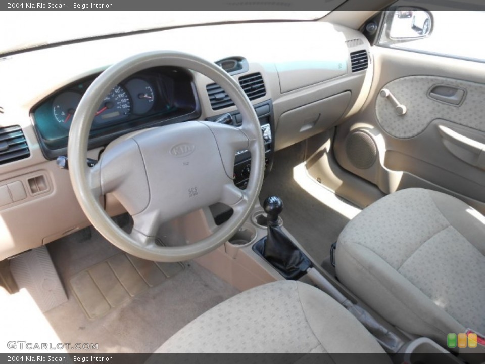 Beige Interior Prime Interior for the 2004 Kia Rio Sedan #80399996