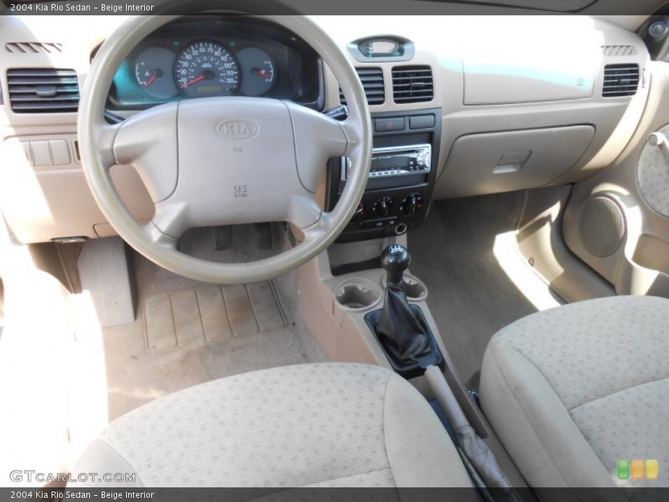 Beige Interior Dashboard for the 2004 Kia Rio Sedan #80400016
