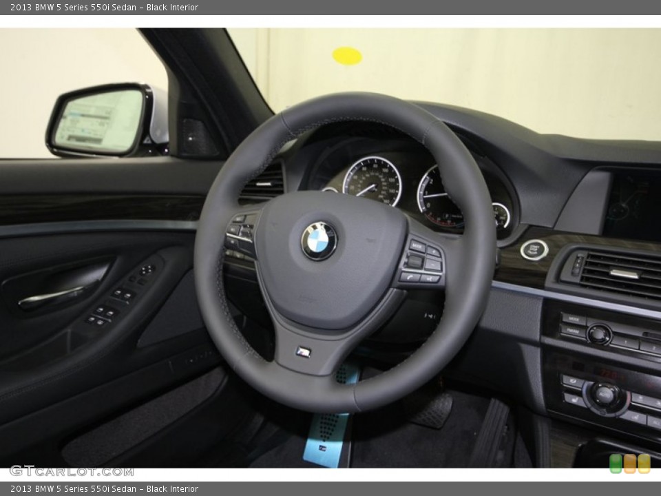 Black Interior Steering Wheel for the 2013 BMW 5 Series 550i Sedan #80422072