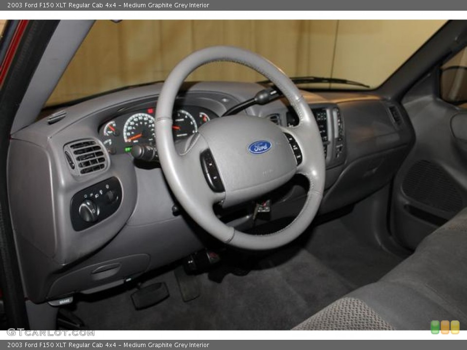 Medium Graphite Grey Interior Dashboard for the 2003 Ford F150 XLT Regular Cab 4x4 #80423647