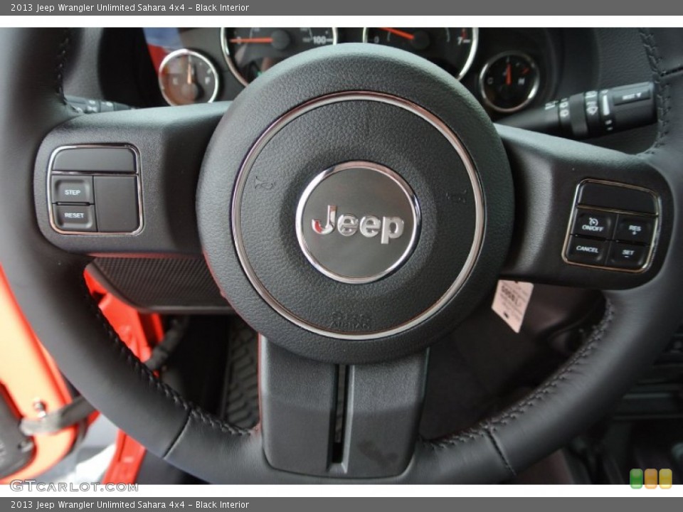 Black Interior Steering Wheel for the 2013 Jeep Wrangler Unlimited Sahara 4x4 #80439369