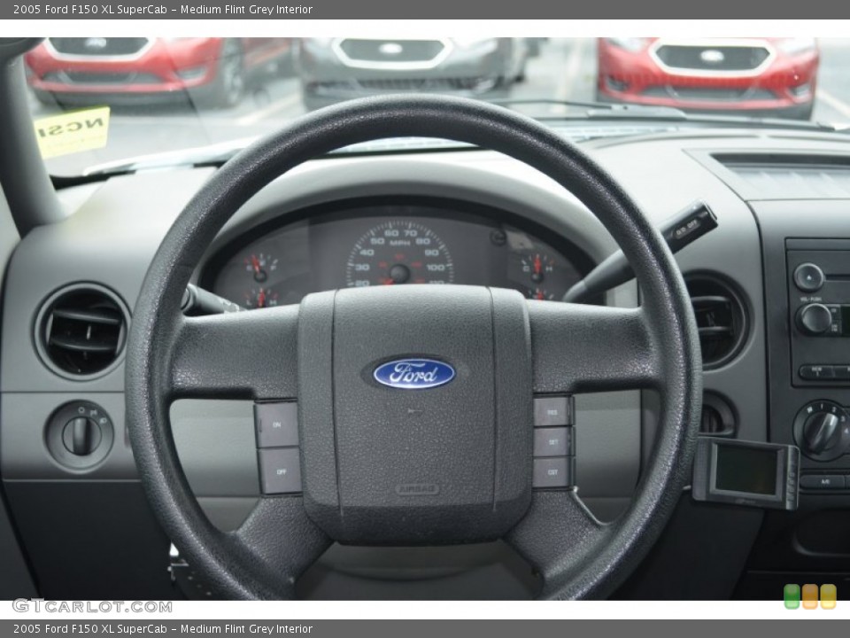 Medium Flint Grey Interior Steering Wheel for the 2005 Ford F150 XL SuperCab #80459057