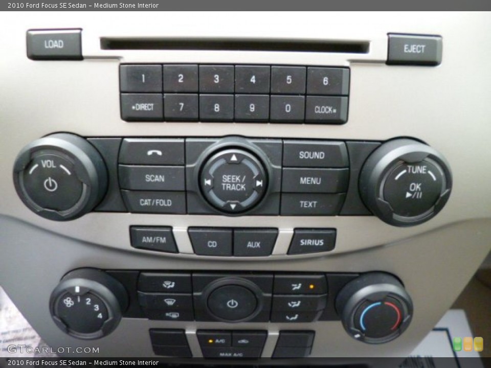 Medium Stone Interior Controls for the 2010 Ford Focus SE Sedan #80469945