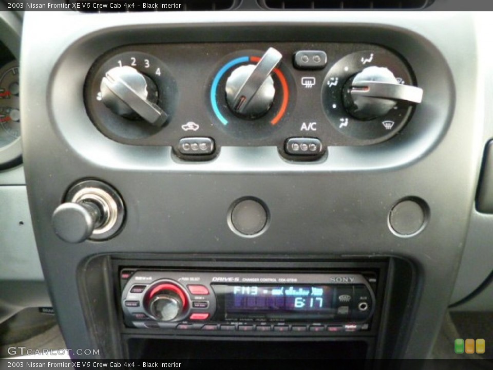 Black Interior Controls for the 2003 Nissan Frontier XE V6 Crew Cab 4x4 #80471593