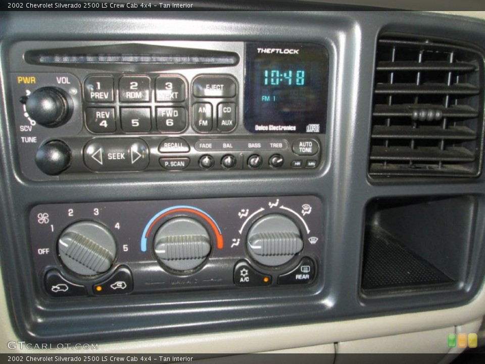 Tan Interior Controls for the 2002 Chevrolet Silverado 2500 LS Crew Cab 4x4 #80494462
