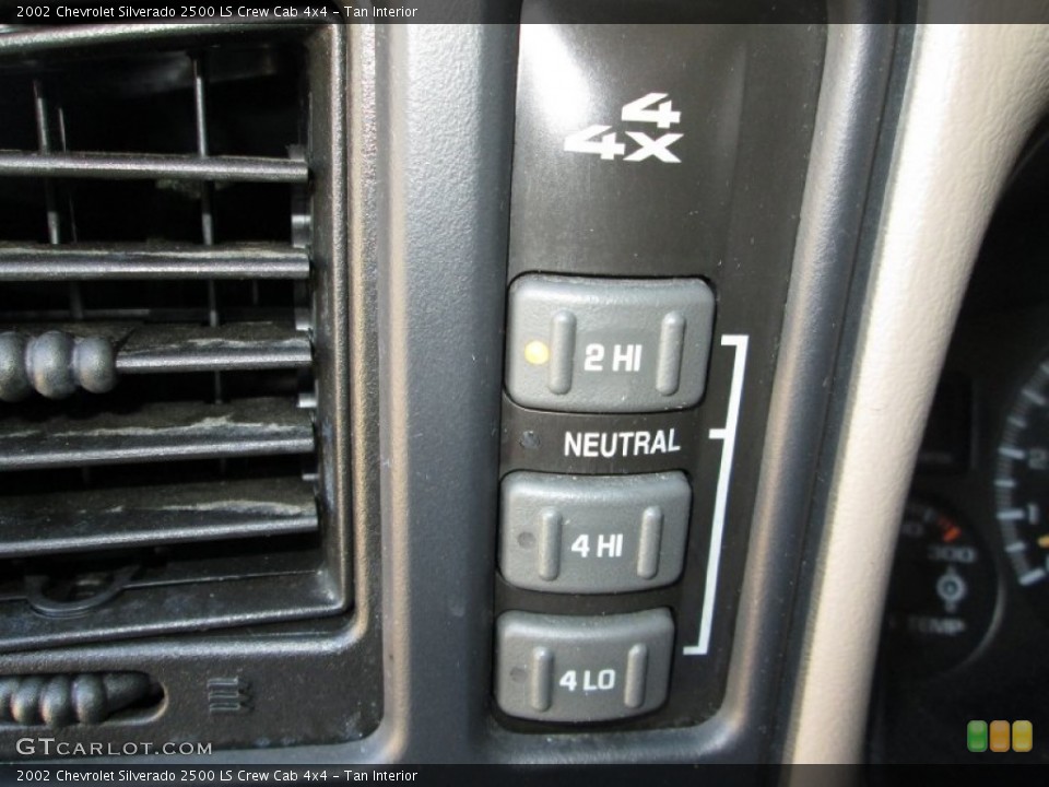Tan Interior Controls for the 2002 Chevrolet Silverado 2500 LS Crew Cab 4x4 #80494546