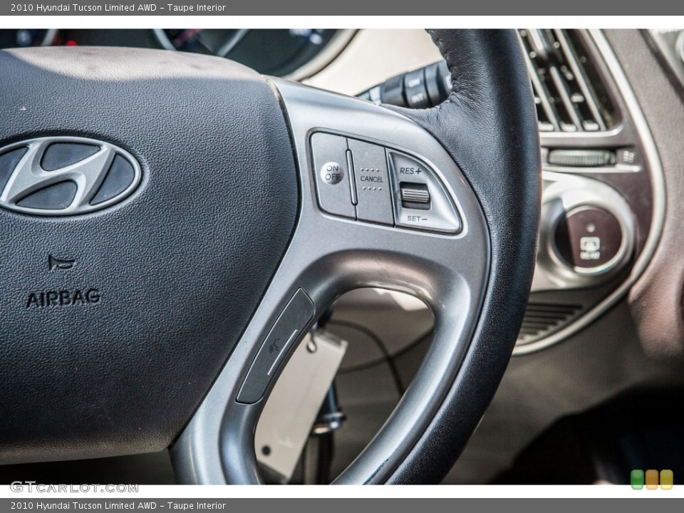 Taupe Interior Controls for the 2010 Hyundai Tucson Limited AWD #80525499