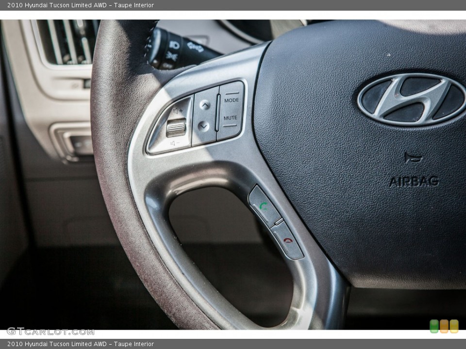 Taupe Interior Controls for the 2010 Hyundai Tucson Limited AWD #80525530