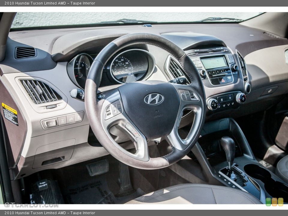 Taupe Interior Dashboard for the 2010 Hyundai Tucson Limited AWD #80525569
