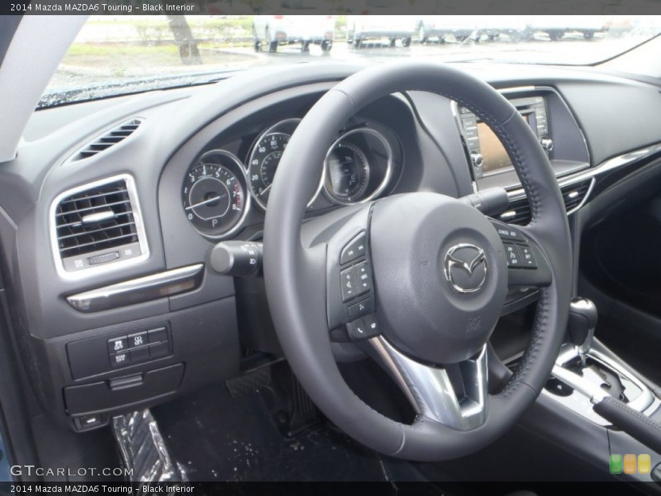 Black Interior Steering Wheel for the 2014 Mazda MAZDA6 Touring #80542021