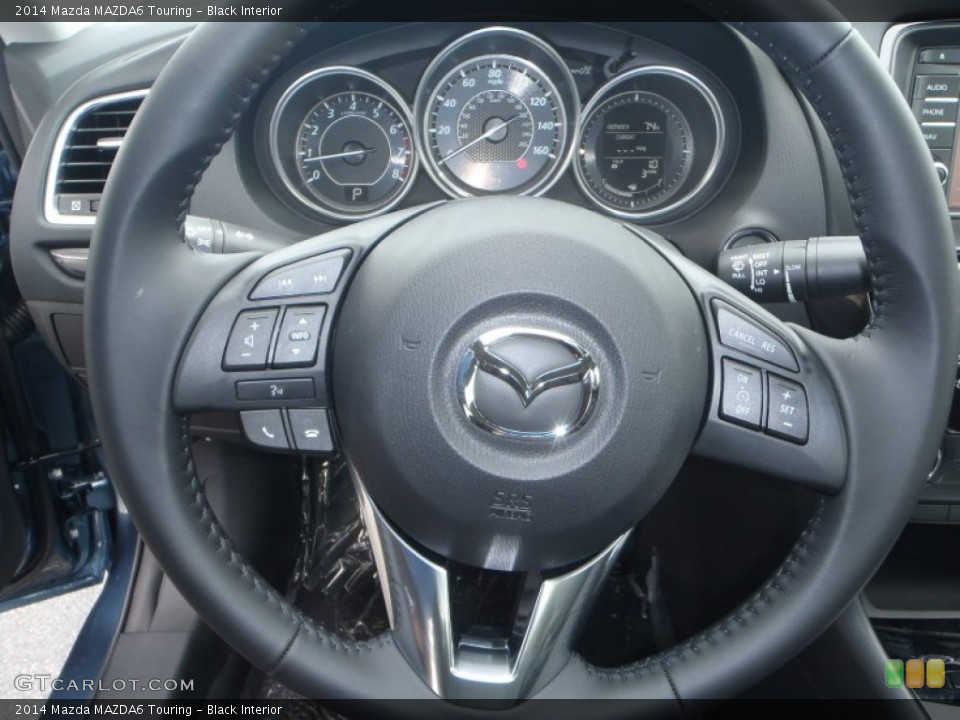 Black Interior Steering Wheel for the 2014 Mazda MAZDA6 Touring #80542045