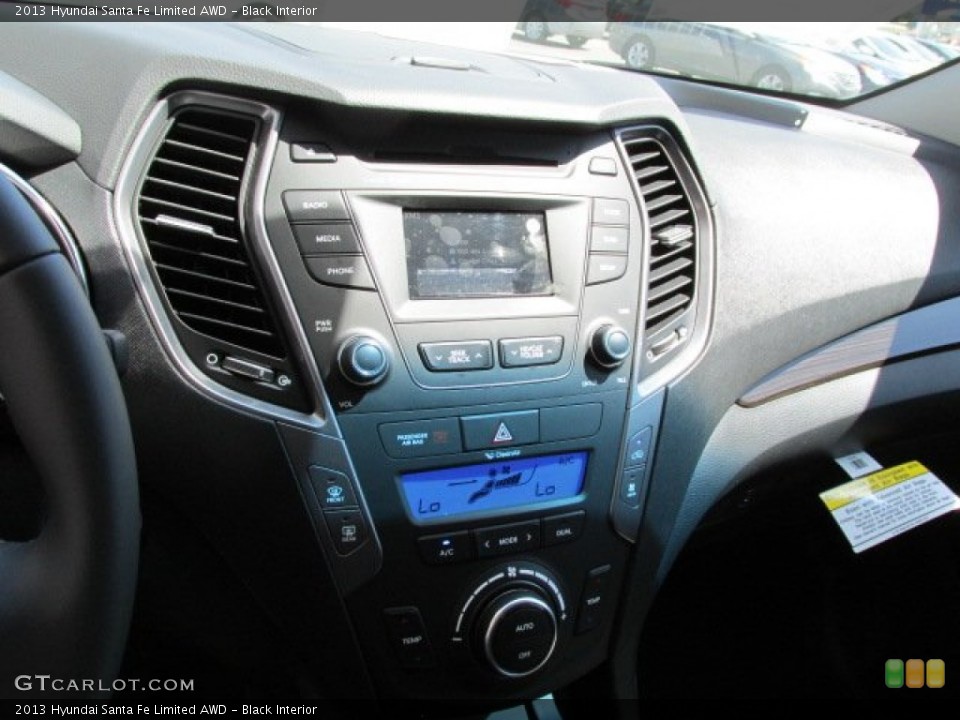 Black Interior Controls for the 2013 Hyundai Santa Fe Limited AWD #80585620