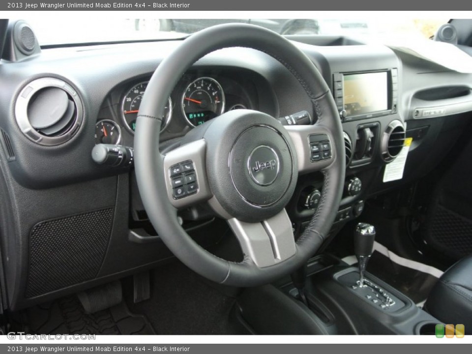 Black Interior Steering Wheel for the 2013 Jeep Wrangler Unlimited Moab Edition 4x4 #80595722