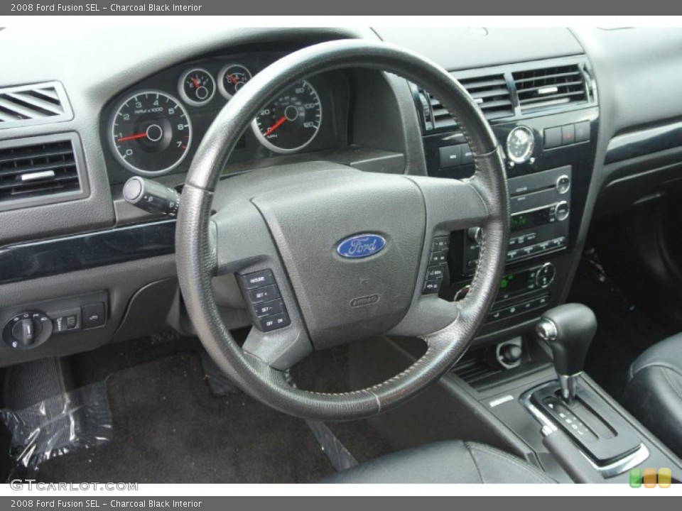 Charcoal Black Interior Dashboard for the 2008 Ford Fusion SEL #80606104