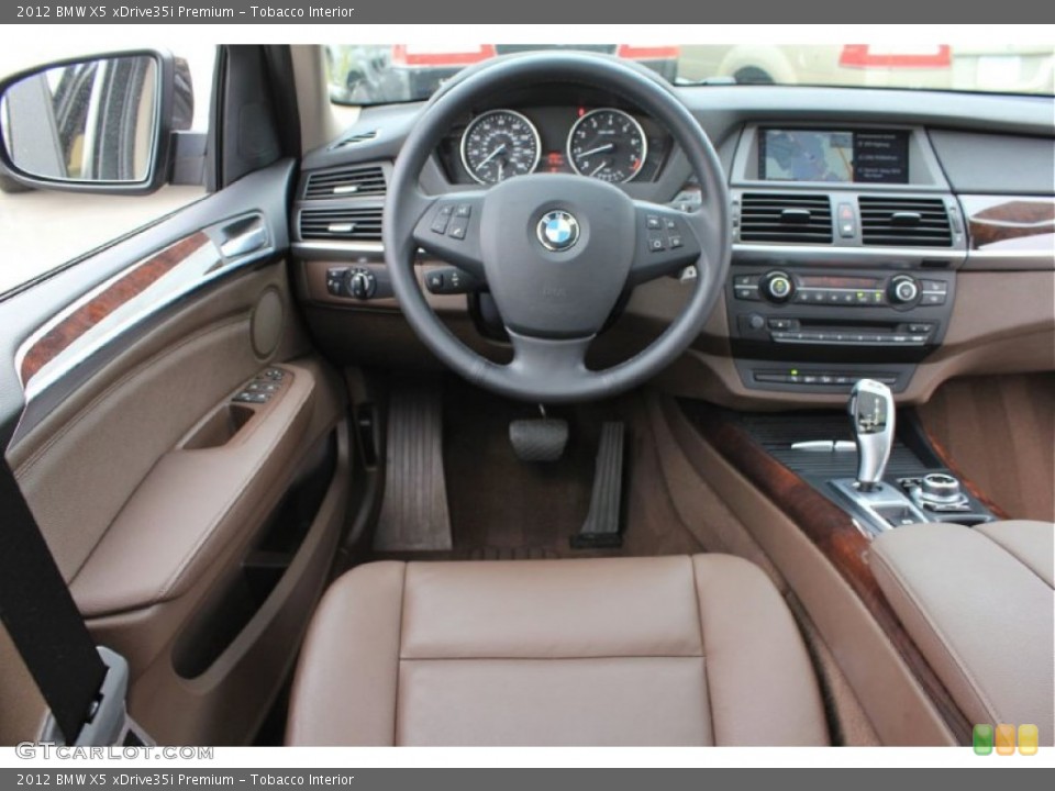 Tobacco Interior Dashboard for the 2012 BMW X5 xDrive35i Premium #80612931