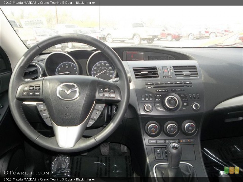 Black Interior Dashboard for the 2012 Mazda MAZDA3 s Grand Touring 5 Door #80675429