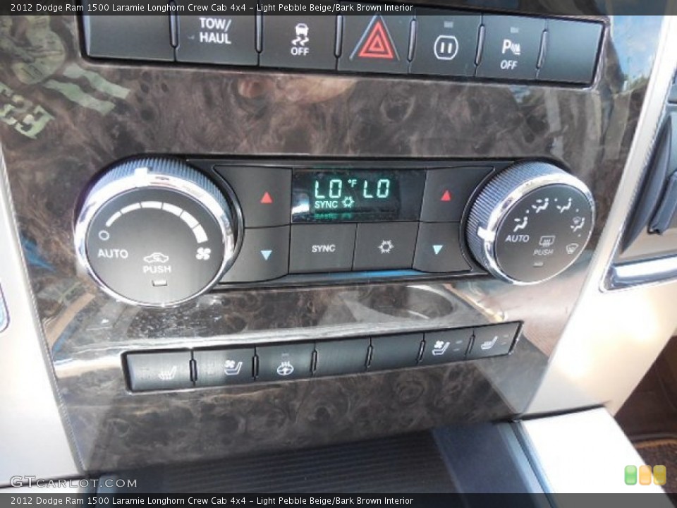 Light Pebble Beige/Bark Brown Interior Controls for the 2012 Dodge Ram 1500 Laramie Longhorn Crew Cab 4x4 #80684186