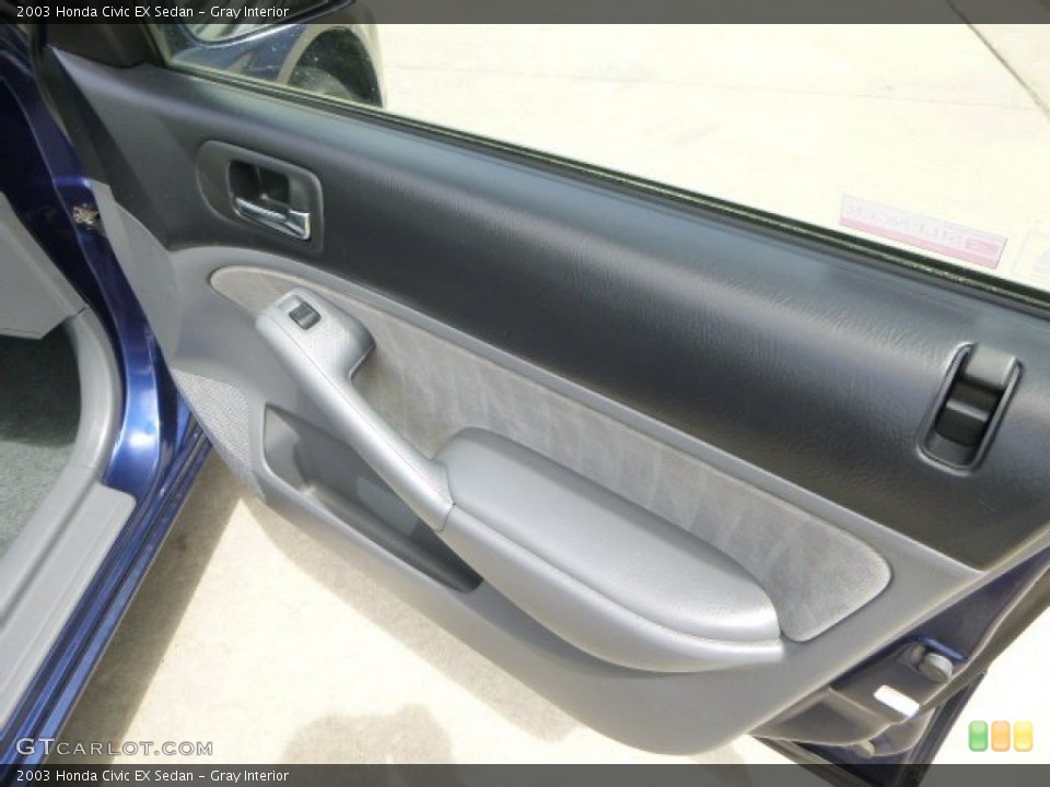Gray Interior Door Panel for the 2003 Honda Civic EX Sedan #80689259