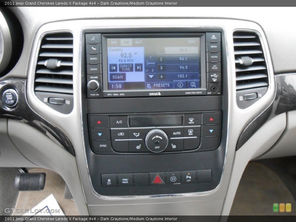 Dark Graystone/Medium Graystone Interior Controls for the 2011 Jeep Grand Cherokee Laredo X Package 4x4 #80702135