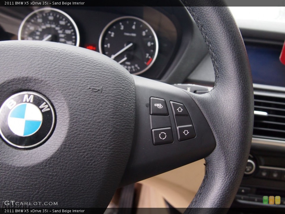 Sand Beige Interior Controls for the 2011 BMW X5 xDrive 35i #80746542