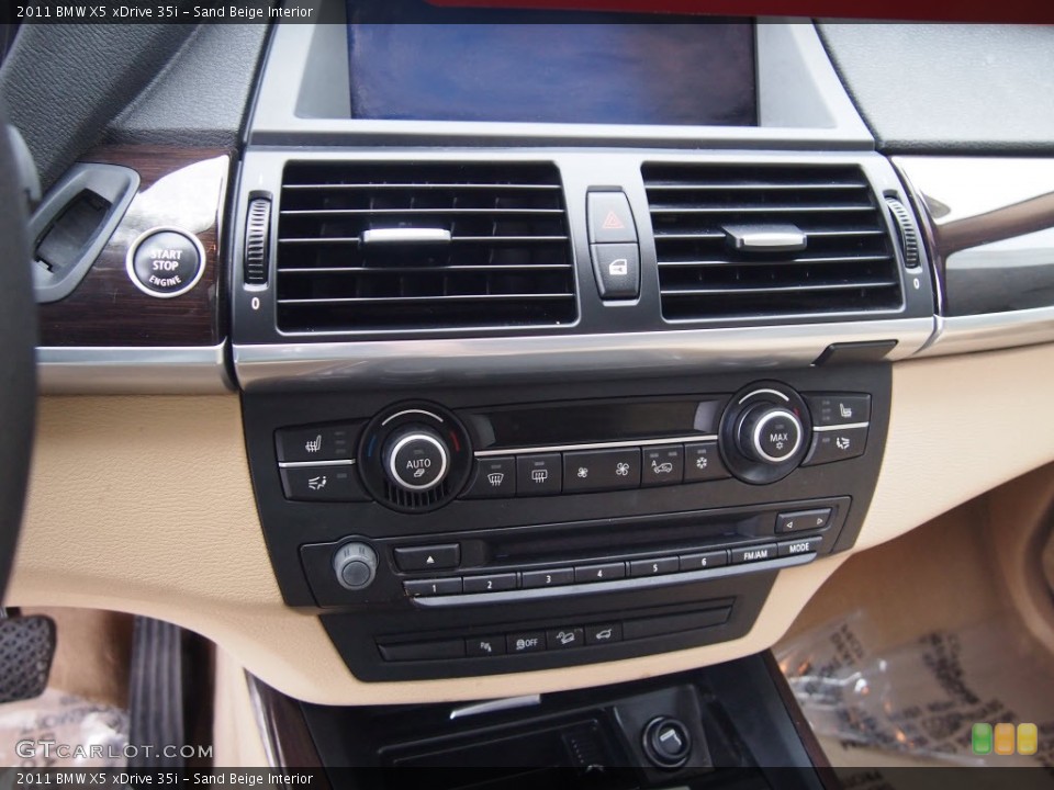 Sand Beige Interior Controls for the 2011 BMW X5 xDrive 35i #80746566