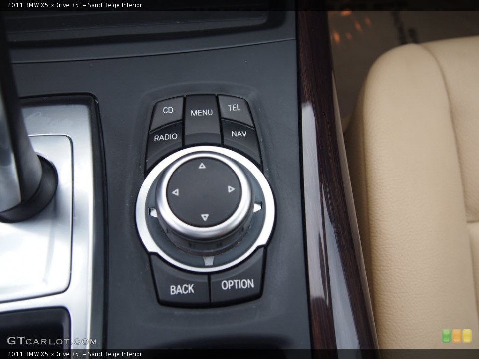 Sand Beige Interior Controls for the 2011 BMW X5 xDrive 35i #80746656