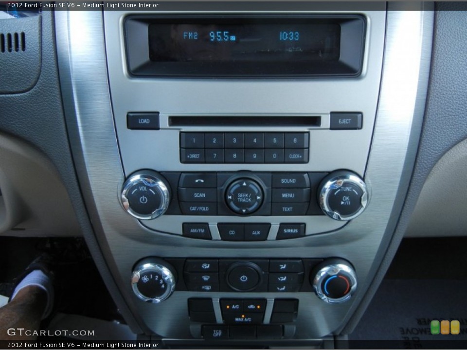 Medium Light Stone Interior Controls for the 2012 Ford Fusion SE V6 #80790189