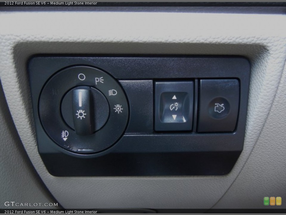 Medium Light Stone Interior Controls for the 2012 Ford Fusion SE V6 #80790209