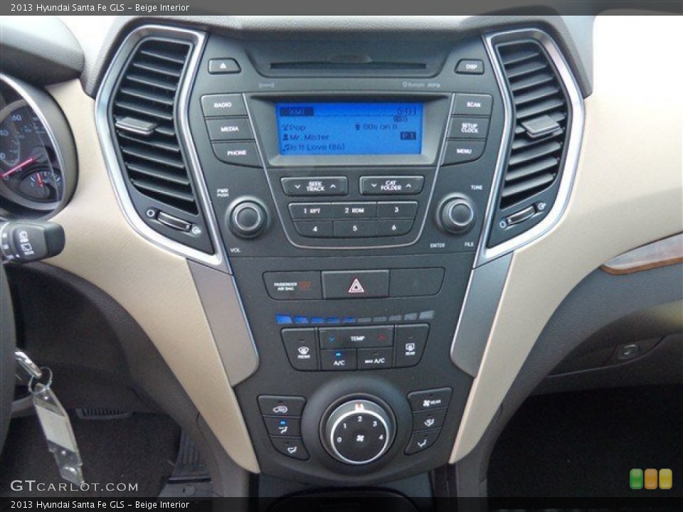 Beige Interior Controls for the 2013 Hyundai Santa Fe GLS #80795576